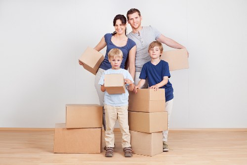 Professional movers loading items for a Crystal Palace move